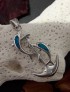 Pendentif Dauphins sur Ancre de Marine orné d'Opale bleue en Argent 925