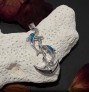 Pendentif Dauphins sur Ancre de Marine orné d'Opale bleue en Argent 925