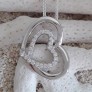 Pendentif 2 Cœurs argent 925 orné de zirconiums