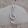 PENDENTIF mixte Clé de sol argent 925